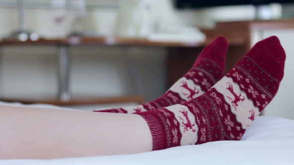 Female Legs In Christmas Socks