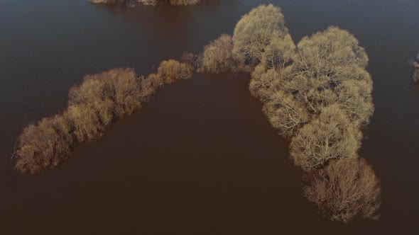 The Camera Flies Low Over the Water During a Flood