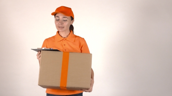 Girl Courier In Orange Uniform Delivering Big Cardboard Parcel