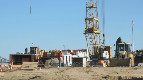 Builder Goes To The Background Construction Site alt