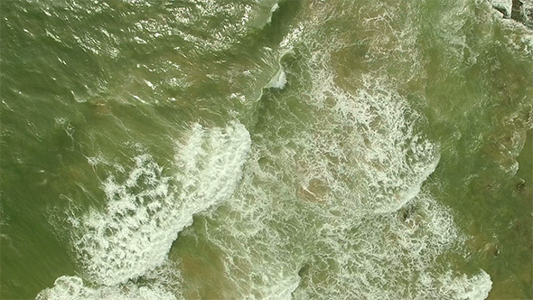 Flyover Ocean Waves and Rocks