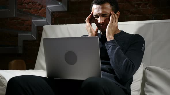 Tension, Headache, Frustrated African Man Working on Laptop