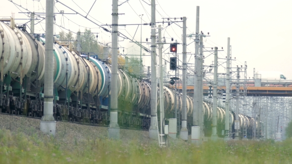 Freight Train Rides By Rail Away Into The Distance