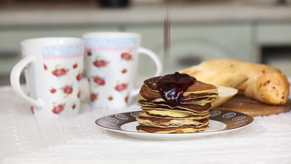 Stack Of American Pancakes With Blackcurrant Jam