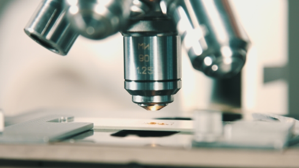 Microscope At Laboratory. alt