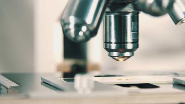 Microscope At Laboratory. alt