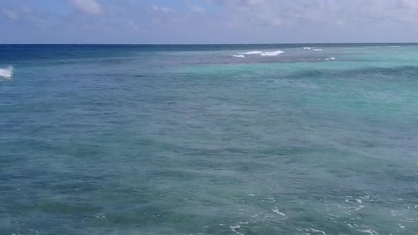 Empty sky of coastline beach break by blue water with sand background near sandbank