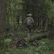 Soldiers Go Through The Woods. Military With Arms Sent To The Thickets Of Green. Airsoft Game - VideoHive Item for Sale