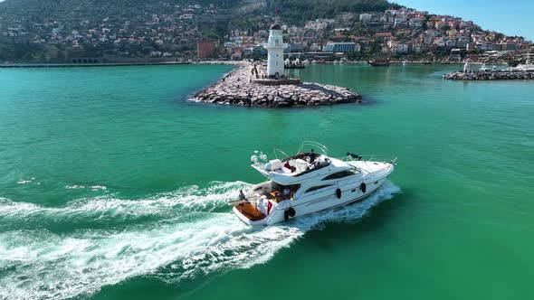 The yacht calls at the port aerial view 4 K