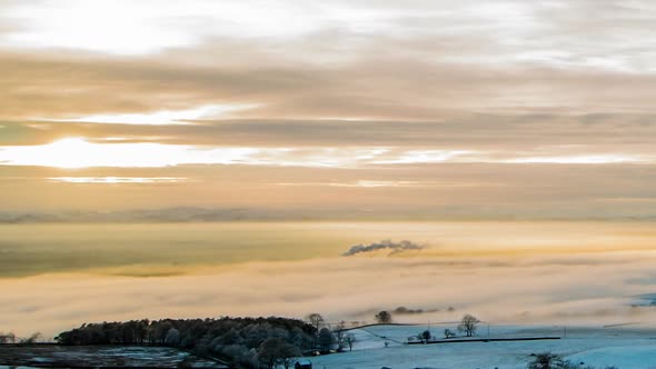 Cloud inversion with winter scenes across the Eden Valley in Cumbria with the sun highlighting the f