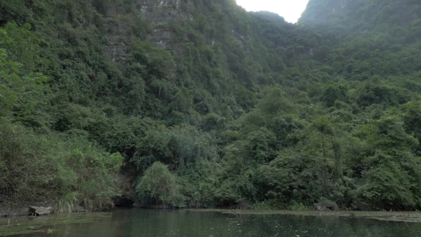 Close Approach To Mountain And Cave By Boat