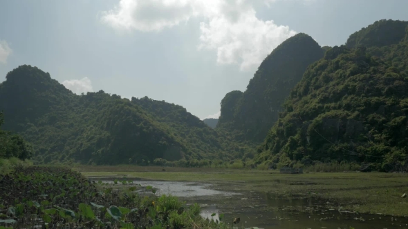 Green Islets And Cemetery In Water, Vietnam