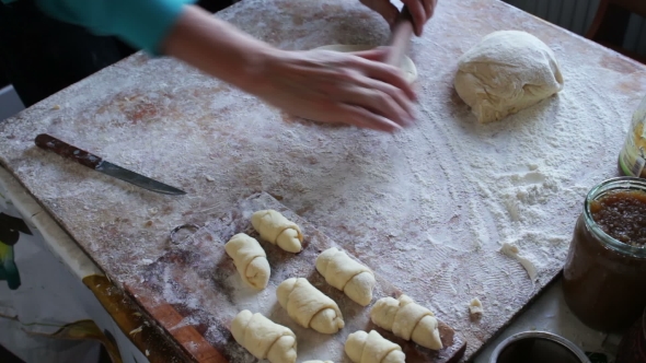 Female Hands Kneading Dough In Flour