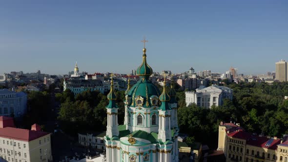 Aerial View of St. Andrews Church, Orthodox Church on Green Hill in the City