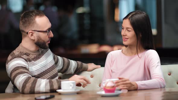 Adorable Pair Talking at Romantic Date in Cafe Relax Having Positive Emotion