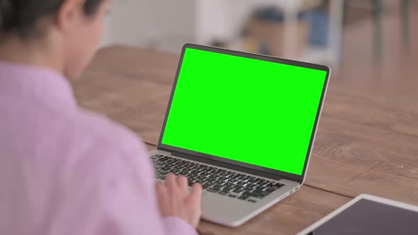 Indian Woman using Laptop with Green Screen