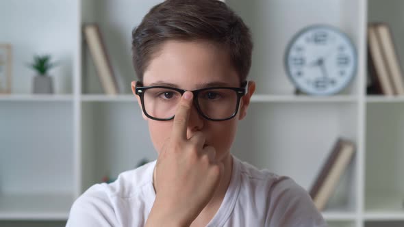 Closeup Portrait of Cute Boy of 11 Years Old with Glasses