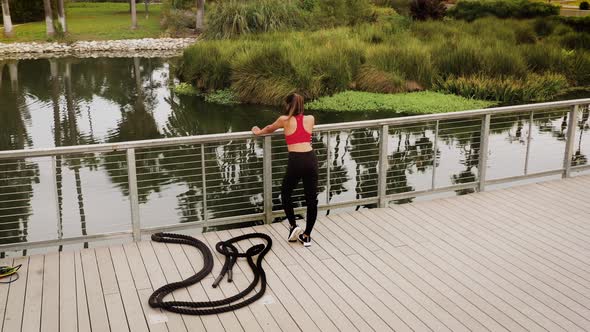 Aerial shot of a woman working out in the park