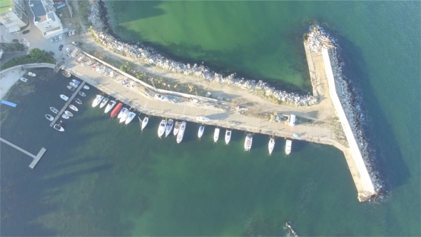 Flying Over the Yachts and the Sea