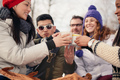 Group of friends enjoying in the snow in winter - PhotoDune Item for Sale