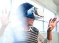 Cool millennial black woman exploring virtual reality glasses in - PhotoDune Item for Sale