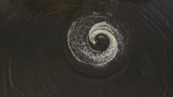 Girl On The Jet Ski In The river.Aerial Video.