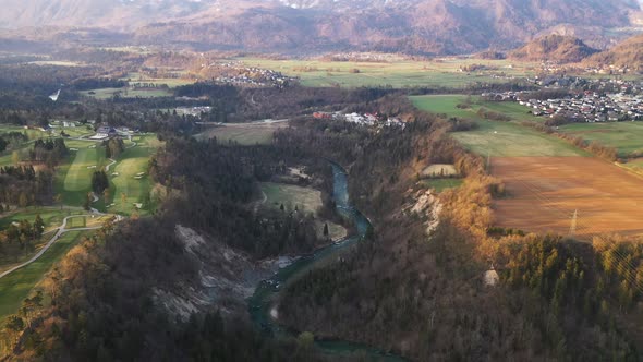 Flying over lakes, trees and countryside on a spring morning