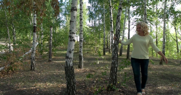 Beautiful Girl In a Summer Forest