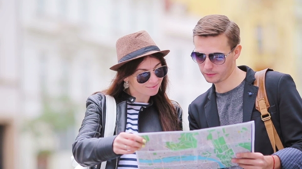 Happy Tourist Couple Traveling on Holidays in Europe Smiling Happy