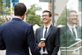 Two businessmen talking outdoors - PhotoDune Item for Sale