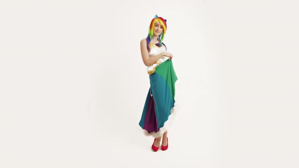 European Woman Cosplayer Dancing Rainbow Dash White Background Full Studio Shot