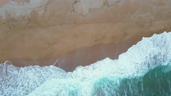 High and powerful waves coming fast to the beach, waves in winter day