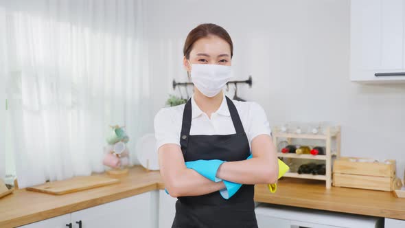 Portrait of Asian young cleaning service woman worker working in house.
