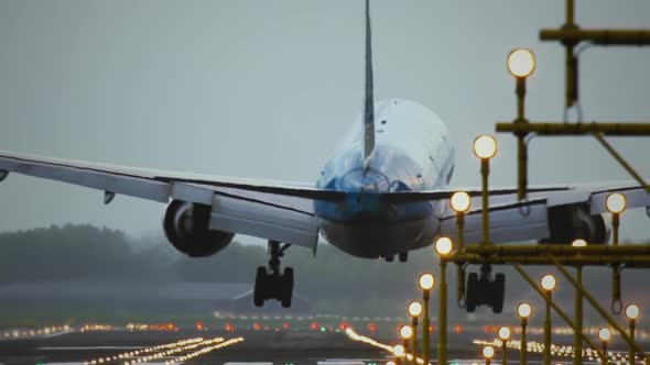 Passenger airplane landing towards the runway