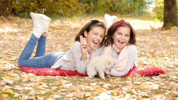 Children With Dog in Autumn