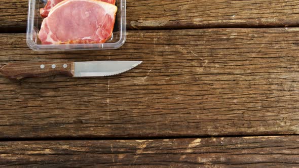 Sirloin chops in plastic container