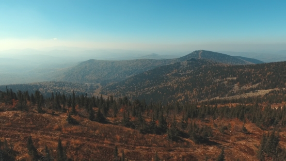 Aerial View Of Mountains. Departure From a Mountain Hill. Siberia.