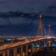 Large suspension bridge over Chao Phraya river with traffic, during night - Time Lapse - VideoHive Item for Sale