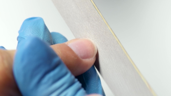 Manicurist Make Shape to the Nail of a Client with Nail File