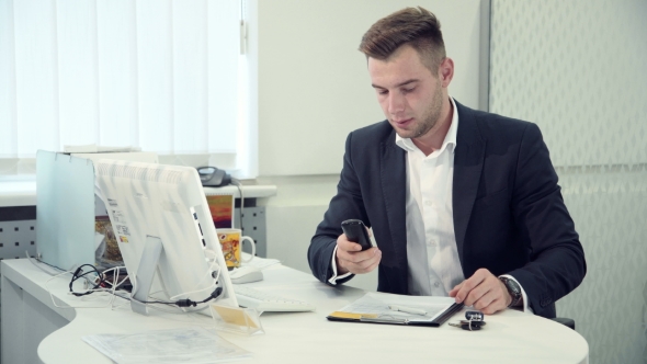 Handsome Businessman Has Bad News By Phone