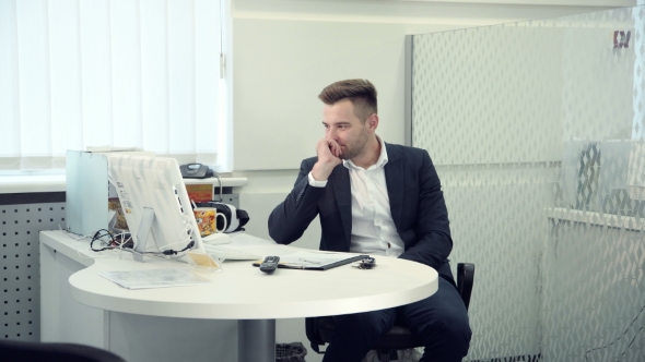 Hardworking Businessman Typing On a Computer and wear VR glasses