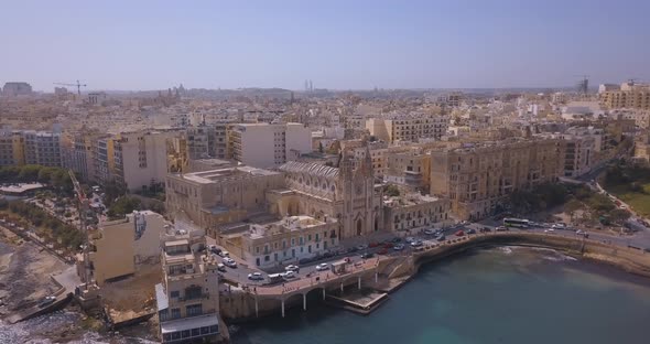 Spinola Bay with Traditional maltese Luzzu