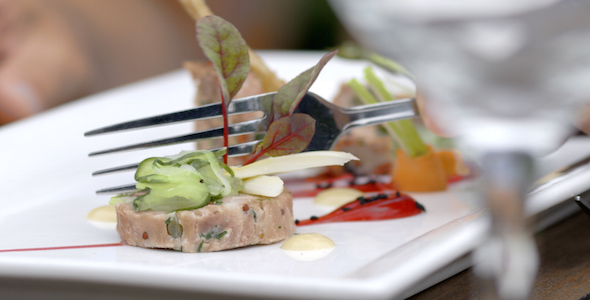 Fork Cuts into Beautiful Alfresco Food