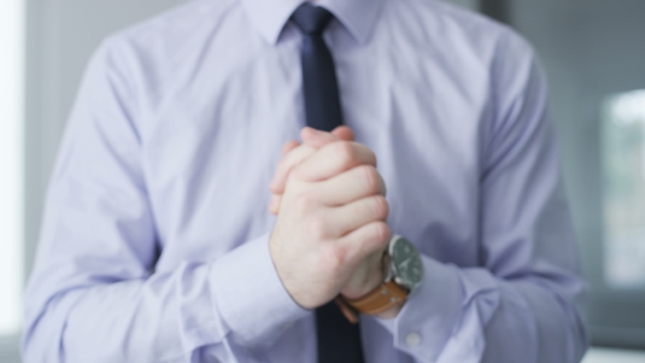 Businessman making gestures with his hands