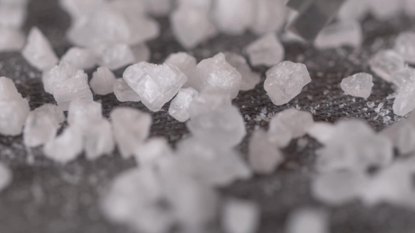 Welsh Sea Salt Flakes On Dark Background.  Of Minerals Droping