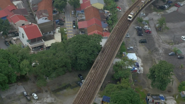 Poor District And Riding Train On Railways. Bangkok, Thailand