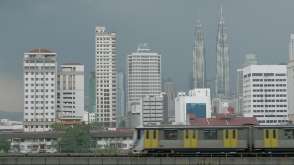 View Of Train And Modern Buildings Skyscraper. Kuala Lumpur