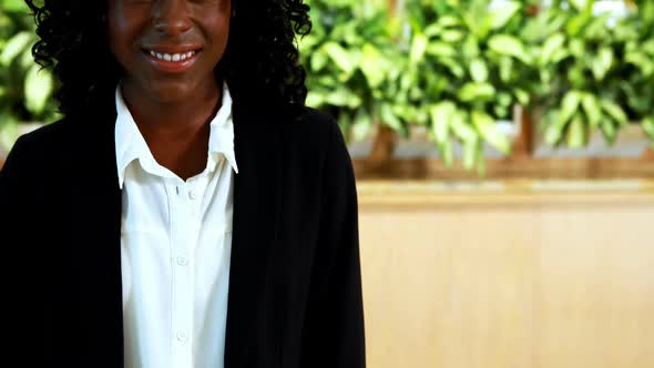 Smiling businesswoman in office