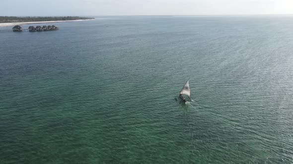 Aerial View of a Boat in the Ocean Near the Coast of Zanzibar Tanzania