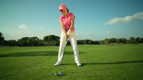 golf woman sport senior outdoors playing